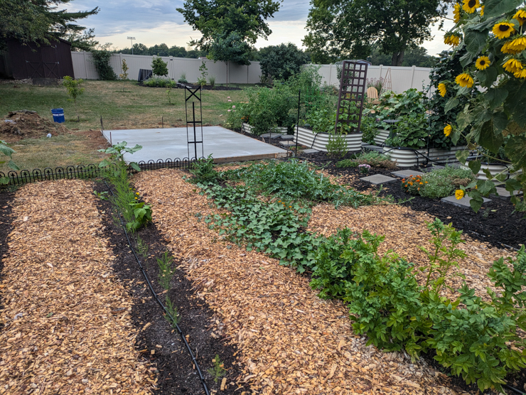 garden with empty concrete pad