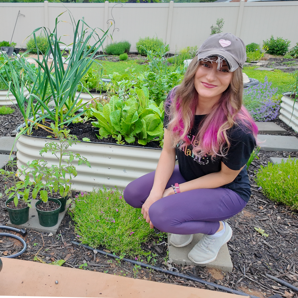 woman sitting in a garden