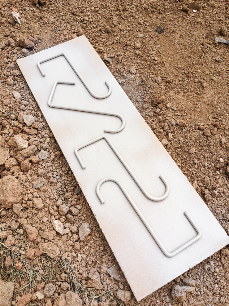 painting hooks for a vinyl fence