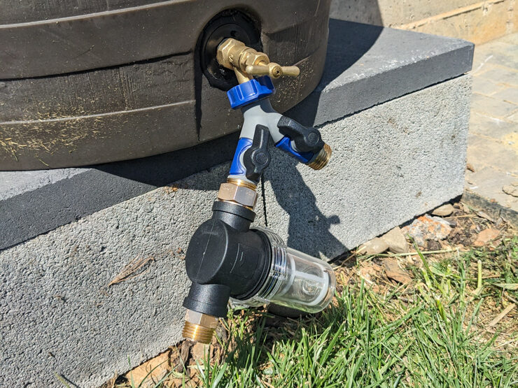 double spigot attached to a rain barrel