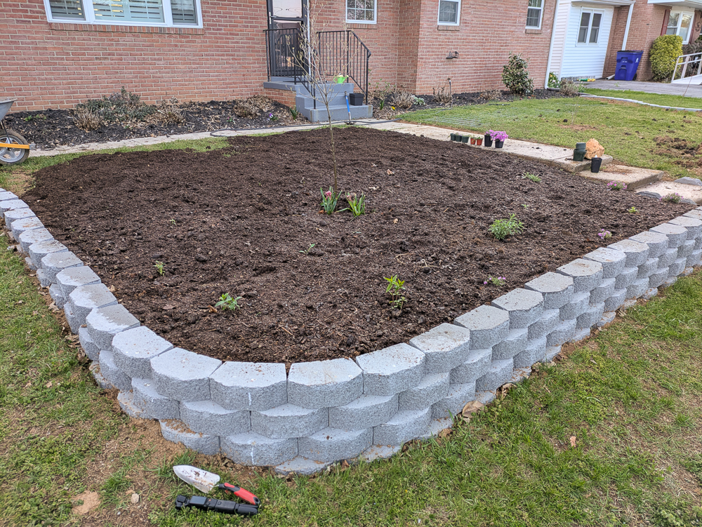 spreading manure on a lawn