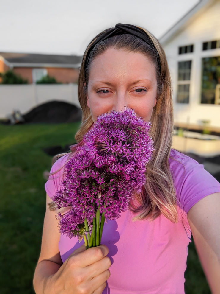 woman with allium flowers
