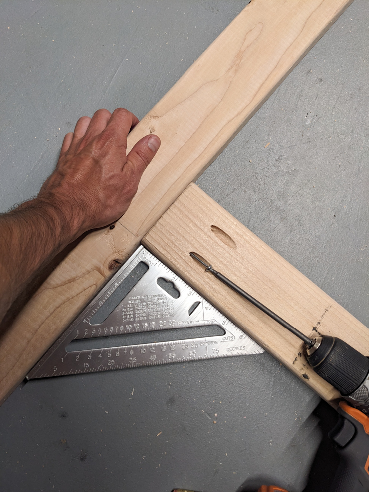 attaching two pieces of wood with a screw